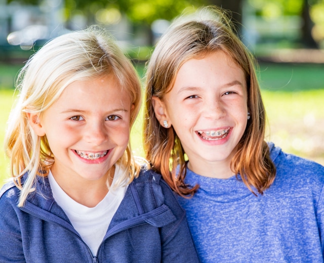 young girls smiling Before and after Imperial Orthodontics in Sugar Land, TX